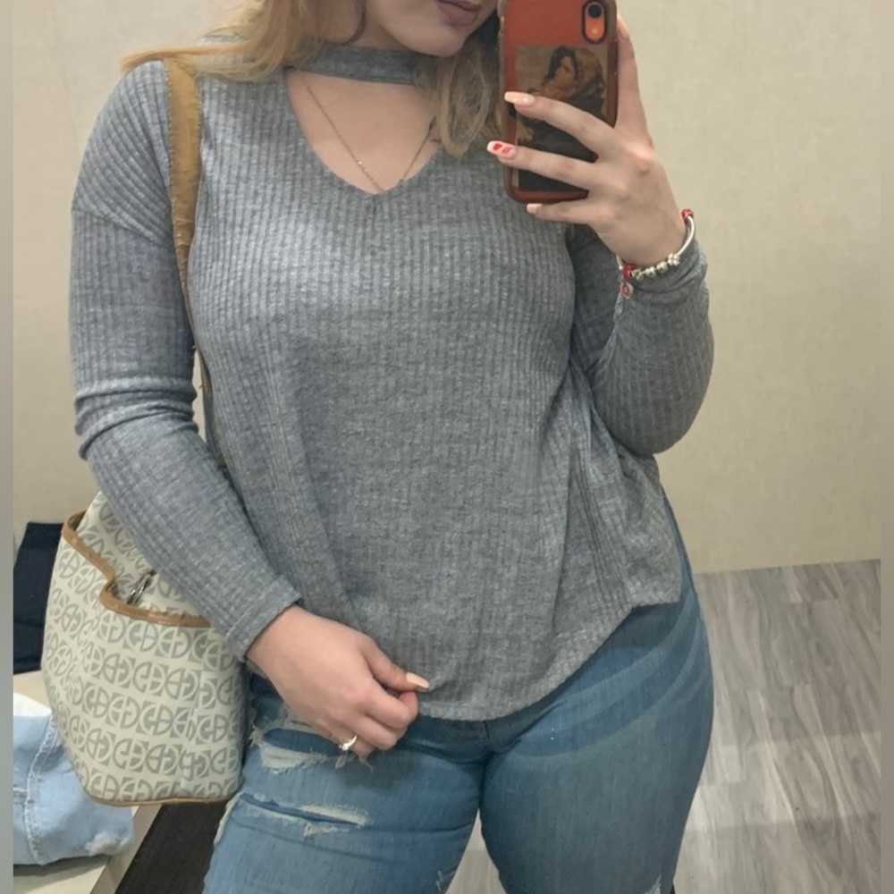 Sweater with lace up back